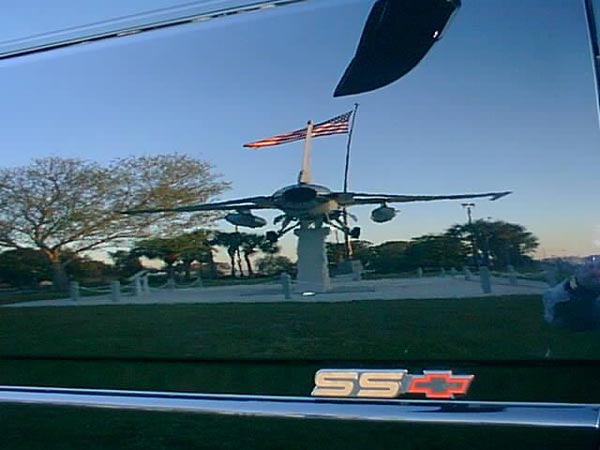 Fighter Jet Reflection in Zaino'd Truck